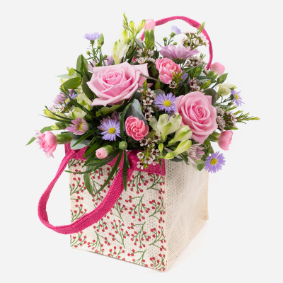 A Little Something
 - Show your affection with this mouth-watering mix of classical flowers delivered in a delightful gift bag or box.