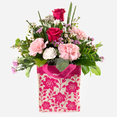 Raspberry Ripple
 - What a cute way to send your message. This little gift bag filled with flowers is simply joyful.