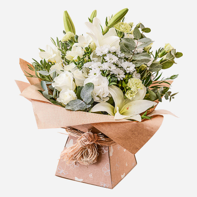 Evelyn - A fabulous collection of white and cream flowers make this the perfect gift. This bouquet will be hand delivered by the local florist.