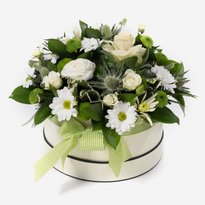 Olivia - A stunning arrangement of luxurious flowers in a white & cream colourway. Made to impress in a stylish hat box.  