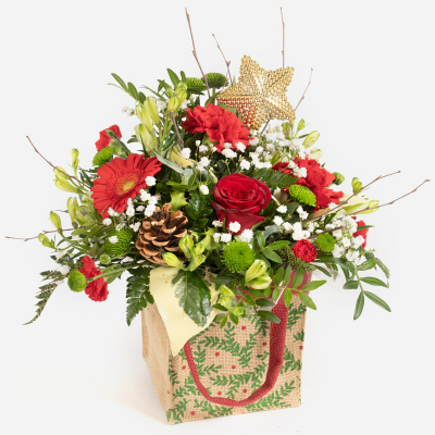 Jingle Bells - A selection of customer favourite flowers and foliage in a design that’s simply the perfect Christmas present.