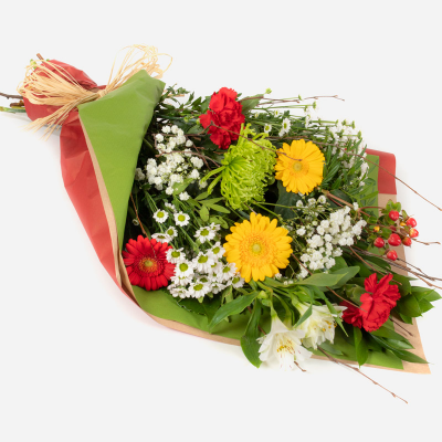 Christmas Charm - This simply wrapped collection of flowers is the perfect way to send your message of good wishes.
